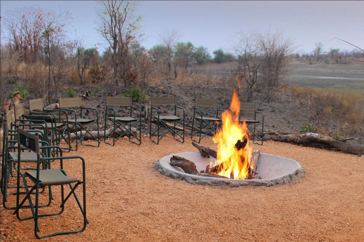 <p>The boma at Little Bush Camp at Sabi Sabi is a traditional outdoor dining area where guests can enjoy delicious meals under the stars while surrounded by the sounds and scents of the African bush.</p>