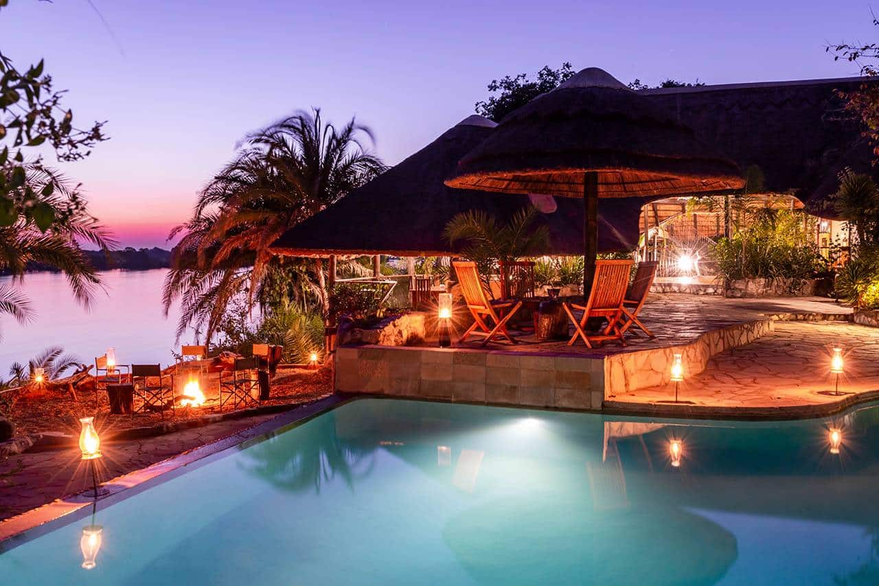 <p>Centrally located you will find:</p> <p>Our Boma (Restaurant/bar/wifi)</p> <p>Infinity Pool and separate children’s paddling pool</p> <p>Several decks with a spectacular view over the Kafue river</p> <p>Food & drinks</p> <p>Mukambi is famous for its excellent cuisine, friendly staff and highly experienced guides.</p> <p>Meals:</p> <p>All accommodation offered at the lodge is on a full board basis (self-catering not permitted). We have a set 3 choice set menu but we do meet all dietary requirements i.e vegan, vegetarian, halaal, gluten, lactose etc.</p> <p>Breakfast: A choice menu including amongst others full English breakfast, eggs Benedict, cereal and fresh fruit buffet, pastries, coffee, tea, hot chocolate or juice.</p> <p>Lunch: a fixed menu is served which consists of a warm meal served with a meat (Beef, Pork,<br /> Chicken or Fish) and either rice, potatoes or pasta and 2 different salads.</p> <p>Dinner: A 3 choice menu including a vegetarian option is on offer every night.</p> <p>Bar & drinks:</p> <p>All drinks are included in the Mukambi Safaris all-inclusive packages. On our full-board rates they are extra.</p>